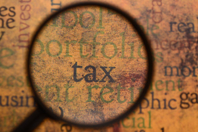 Tax under magnifying glass