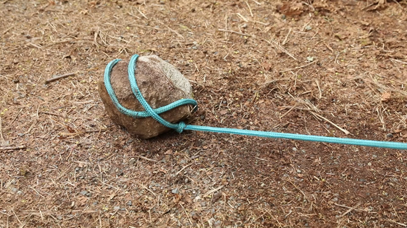 Rock tied to rope