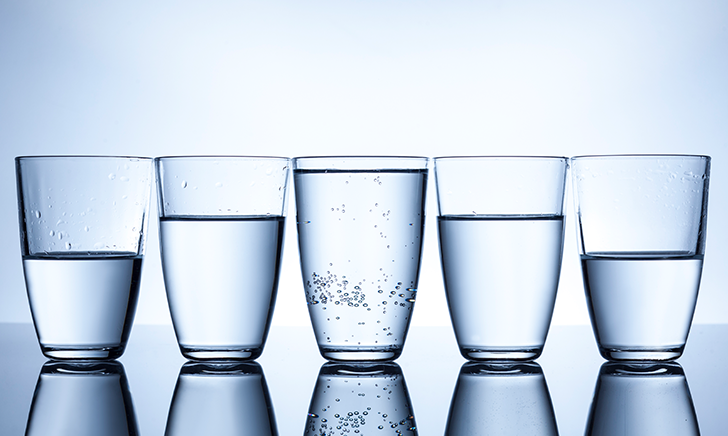 Glasses filled with water at various volumes
