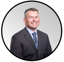 Professional businessman portrait in dark suit