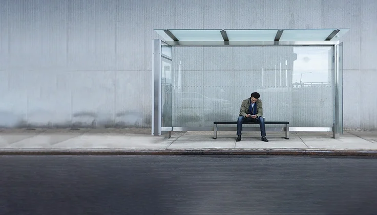 Man sitting on a bench.