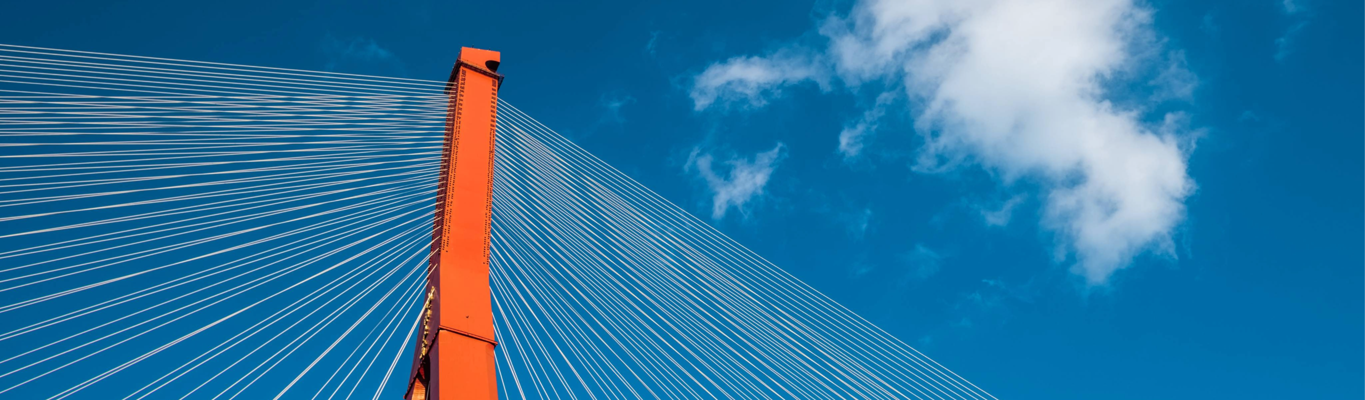 Modern cable stayed bridge against blue sky