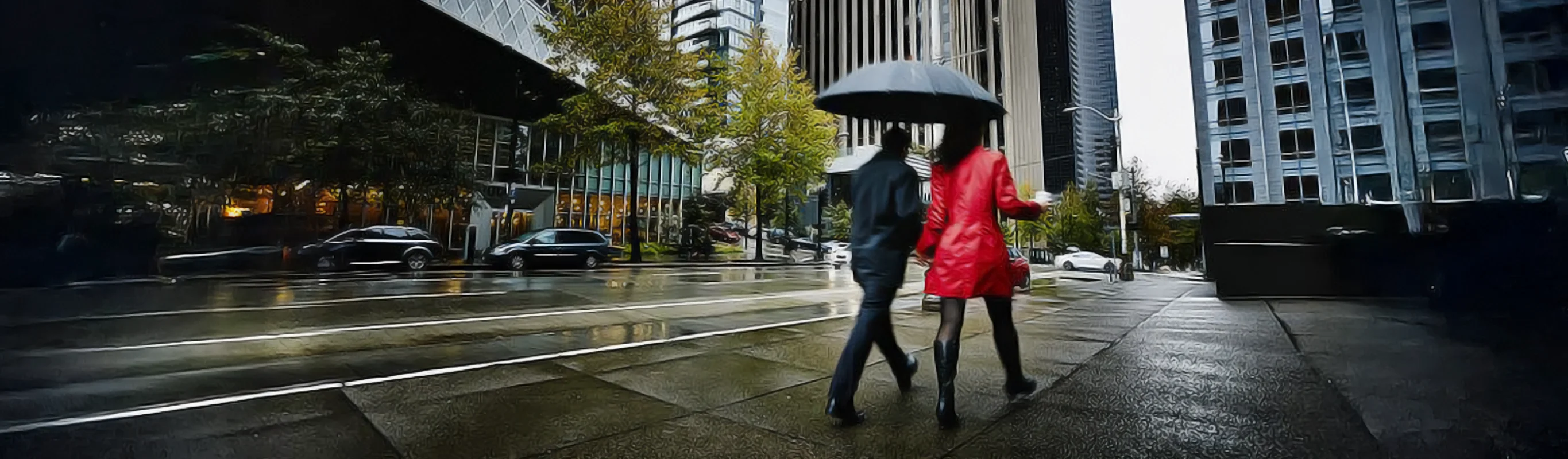 Urban pedestrians walking in rainy weather