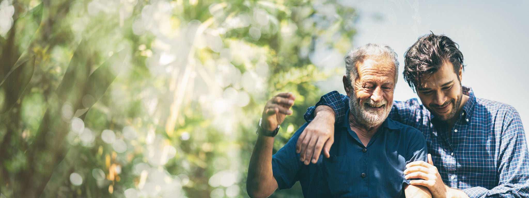 Celebrate Father's Day with Family: A Day of Joyful Bonding and Love, Fathers and Sons Sharing Hugs and Cheers at Home, Embracing Summer's Cheerful Spirit of Togetherness and Care