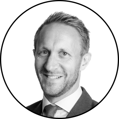 Portrait of professional in suit, anonymized