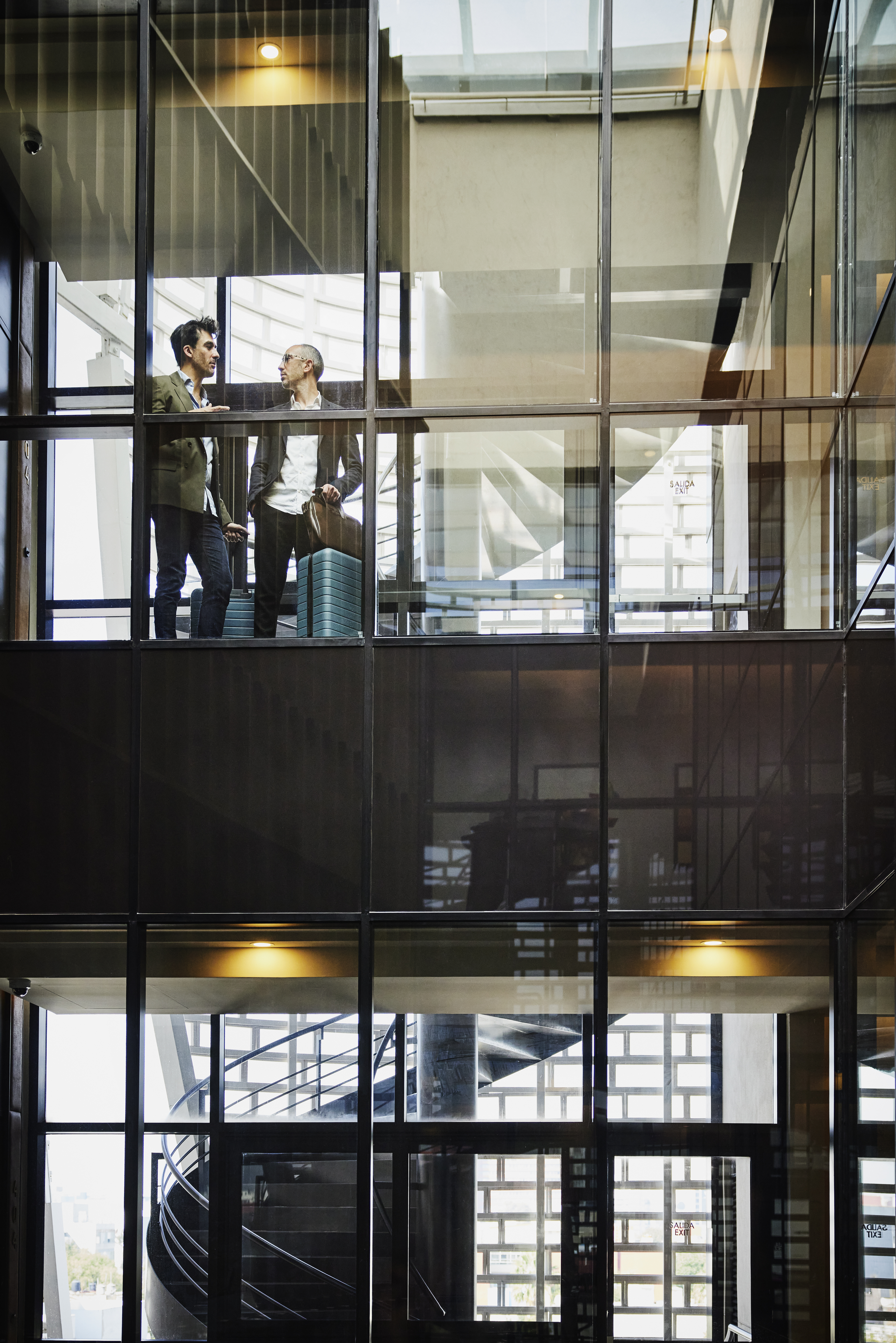 two people talking in an office space
