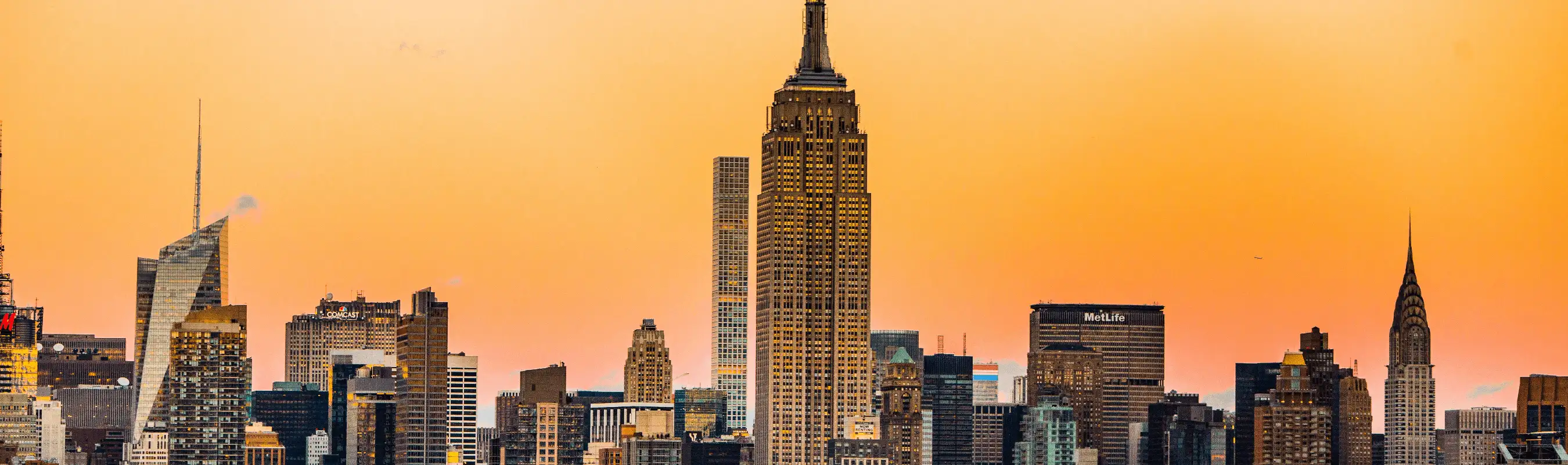 New York City skyline at sunset with skyscrapers