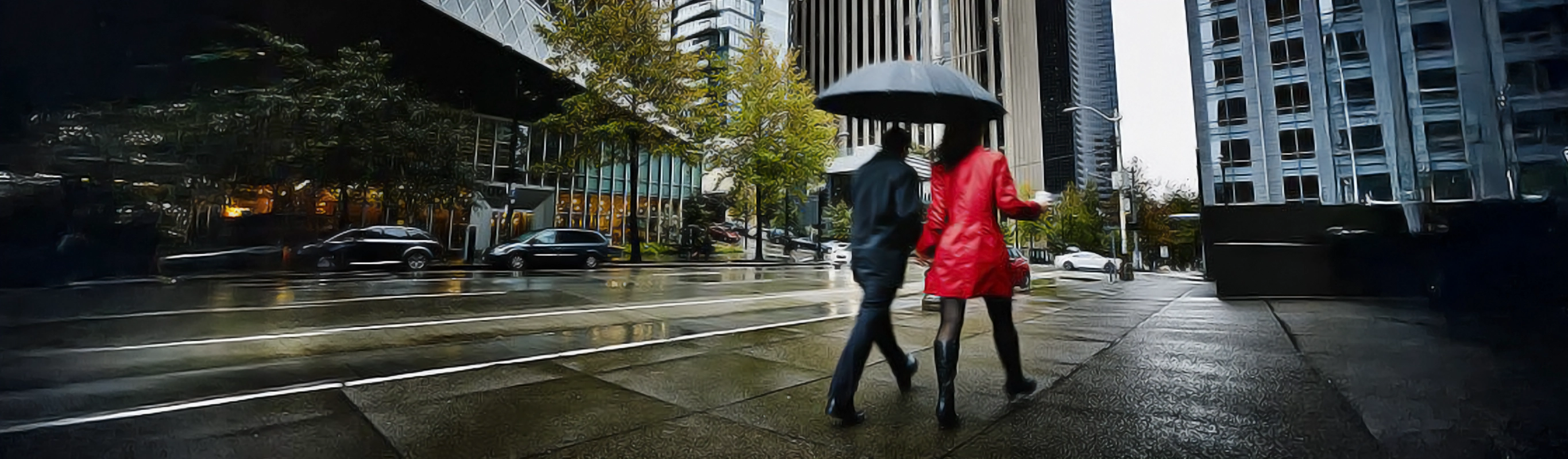 Urban pedestrians walking in rainy weather