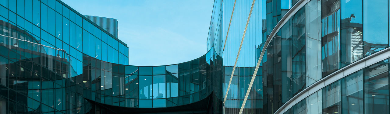 Modern glass buildings with curved architecture