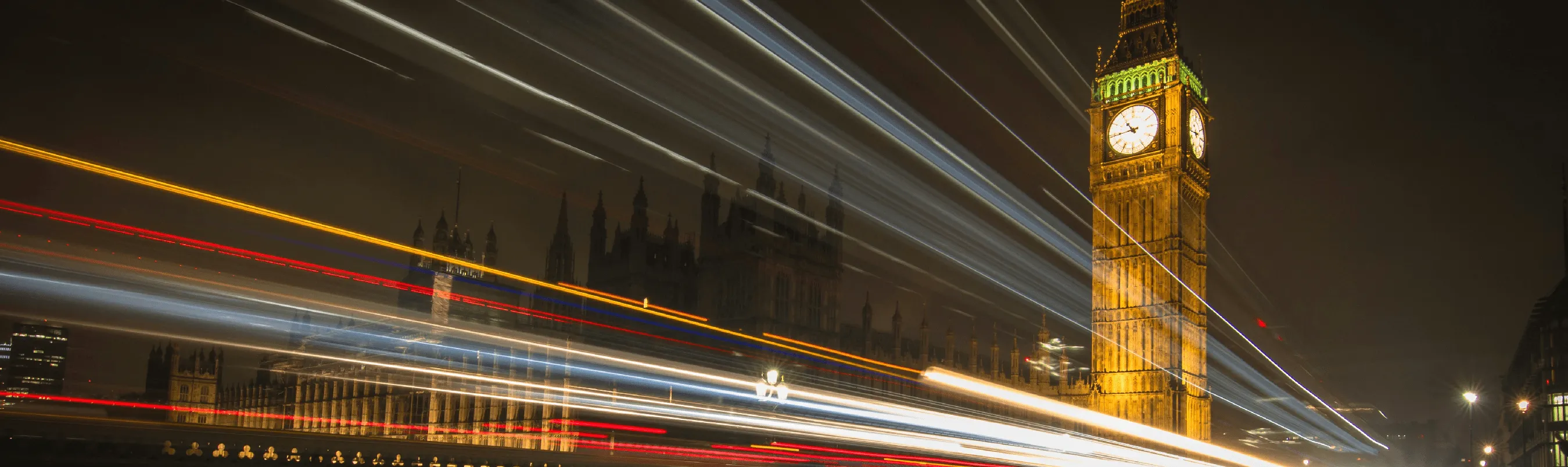 Night view of Big Ben with light trails