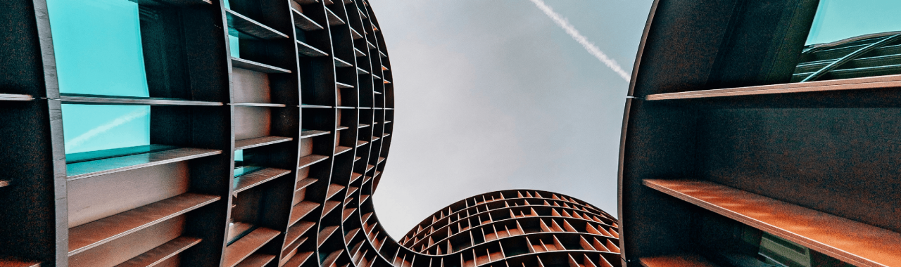 Modern curved office buildings against sky